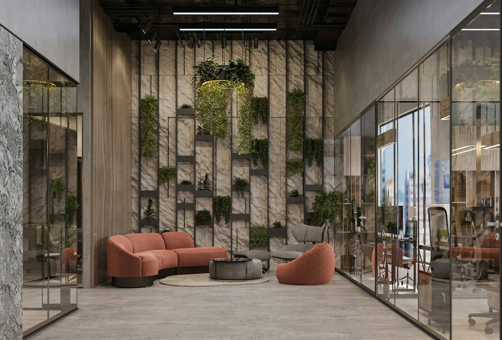 Espace de détente avec canapé terracotta et mur végétal, bureaux tertiaires de Saint-Brieuc